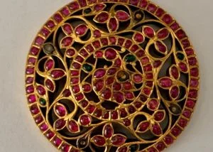 Antique Ruby Rakkodi (head ornament placed in the center of the back of the head. Just above the braid). Private collection.